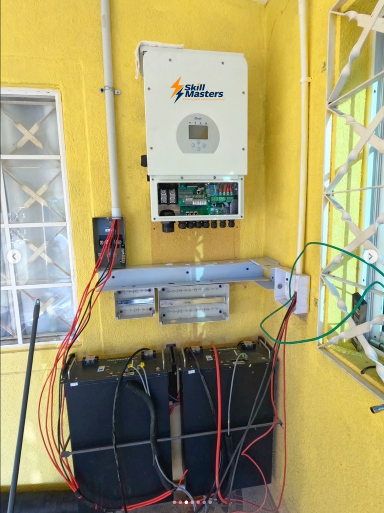 Open inverter panel showing organized internal wiring